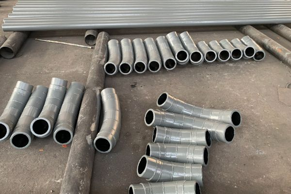 為什么精礦輸送高鉻合金耐磨彎頭使用壽命更長(cháng)?[江河]